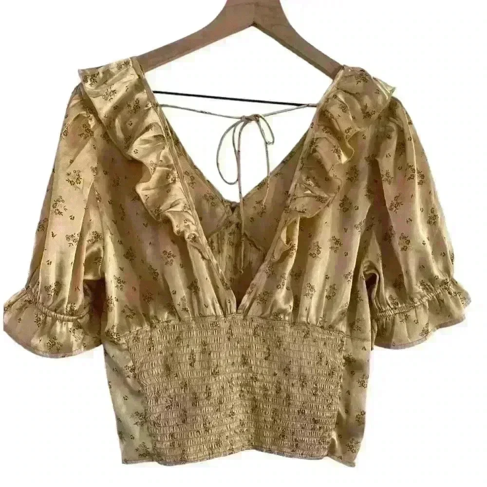 FREE PEOPLE Isabella Silky Floral Ruffle Babydoll Blouse in Copper‎ color